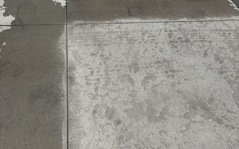 Concrete slab showing treated and untreated sections