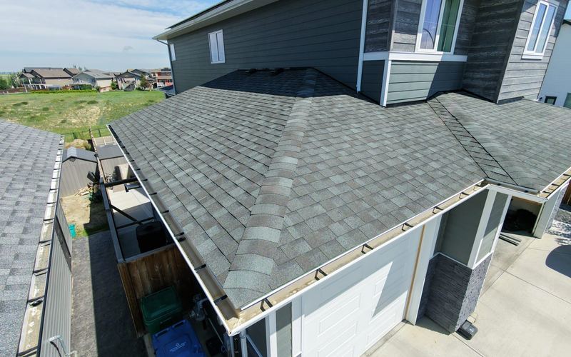 Drone photo of a well-kept grey shingle roof