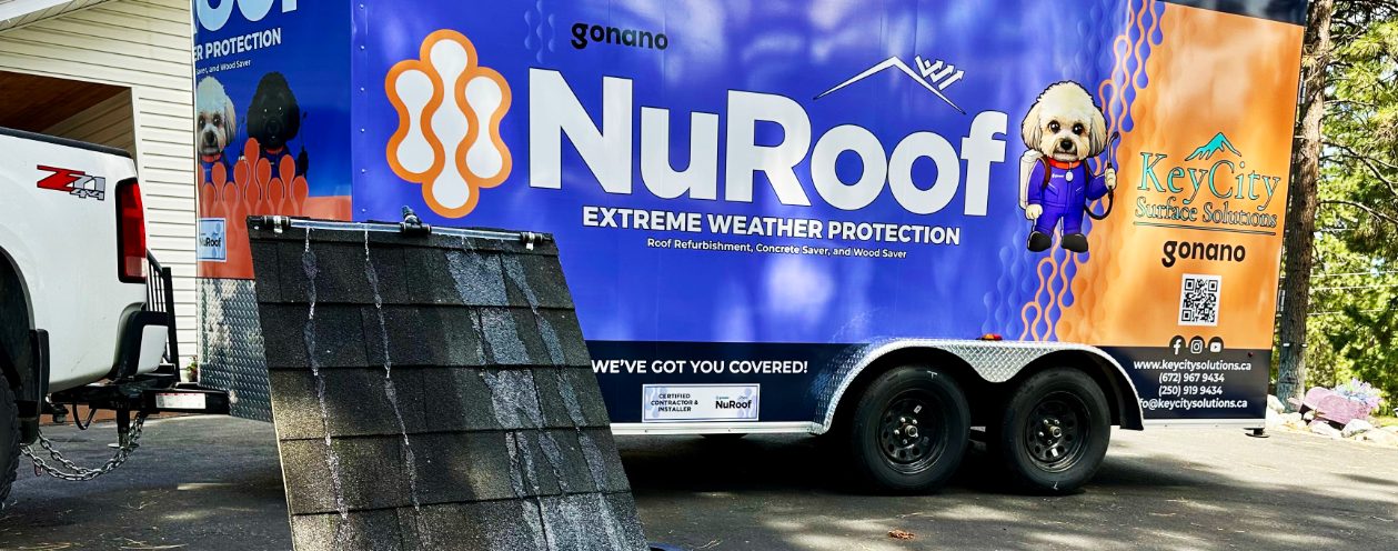 A demonstration of NuRoof products, showing a piece of roofing treated with them.